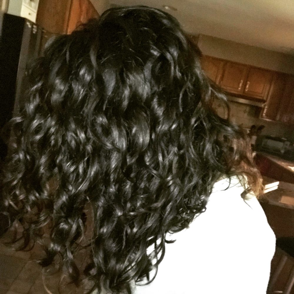Sana's curls, no face visible